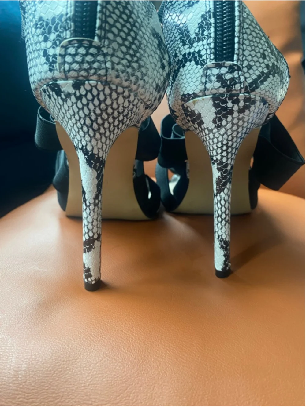 Black and white snake skin strap stiletto sandals pumps